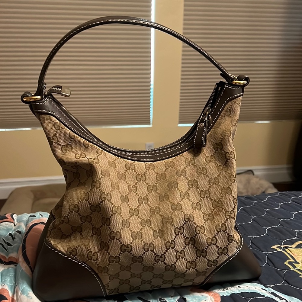 Authentic Gucci leather and canvas purse.